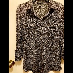 Blouse grey black white in color